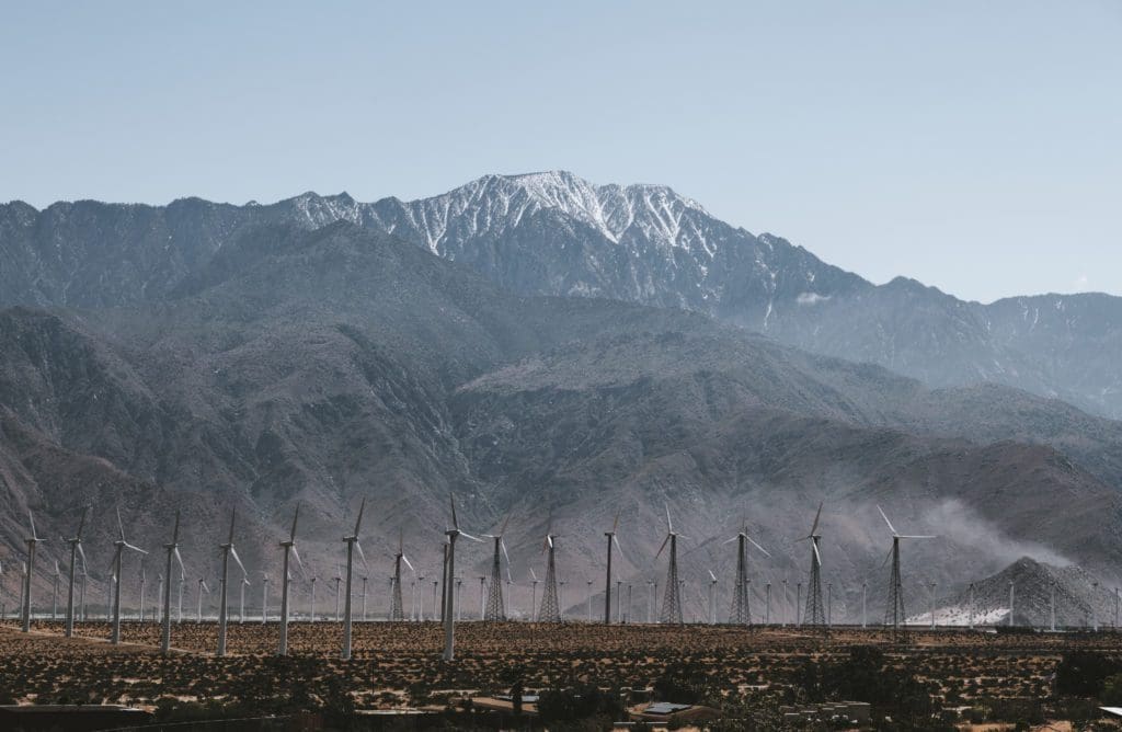 Windmill Farm with mountains in background, Desert Hot Springs, CA